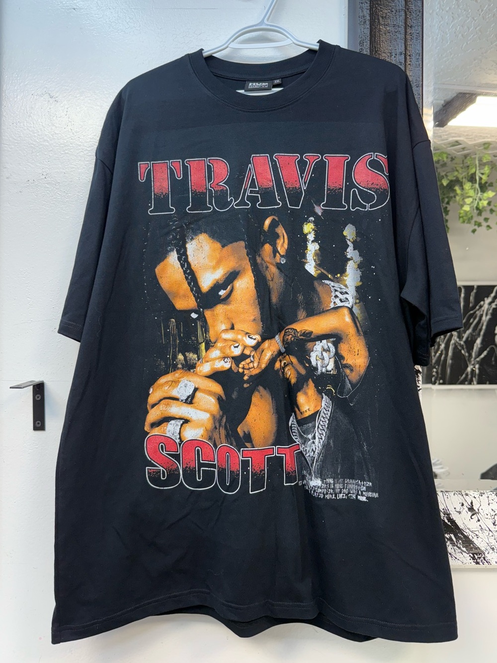 Travis Scott Black Tee with Red Logo and Yellow-Orange Portrait